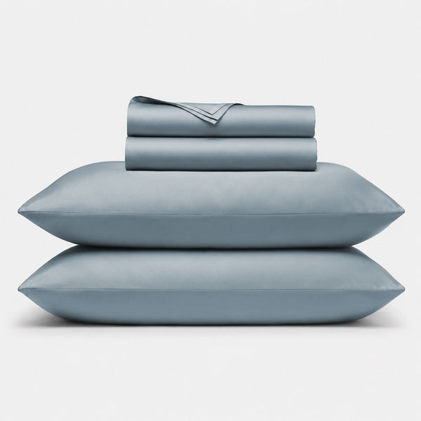 Stacked 100% bamboo sheet sets in shore blue