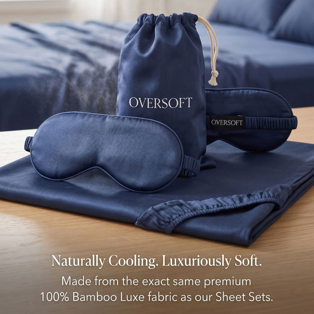 100% Luxe Sateen Bamboo Eye Mask with matching travel pouch on a bamboo sheet set